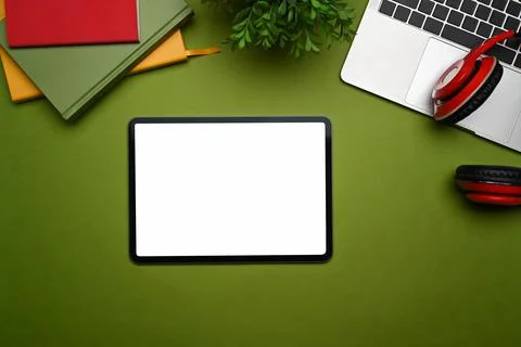 Flat lay, mockup digital tablet, headphone, laptop computer and notebook on Stock Photos
