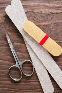 Flat lay mockup with manicure tools, scissors, nail file, cotton pad Stock Photos