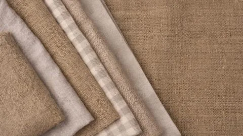 Flat lay monochromatic colored textiles with copy space Stock Photos