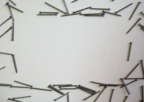 Flat lay nails on a white background. Copy space. Stock Photos