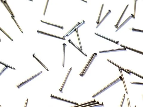 Flat lay nails on a white background. Copy space. Stock Photos