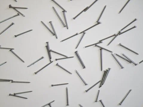 Flat lay nails on a white background. Copy space. Stock Photos