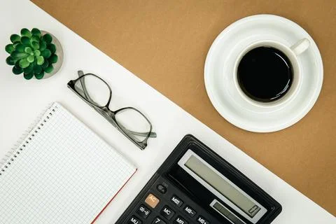 Flat lay, notepad, calculator and coffee cup, office concept. Foto stock