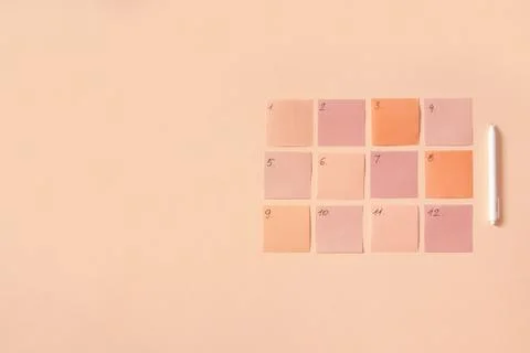 Flat lay of notepad with words Goals 2021, colorful sticky notes, o'clock, pen Stock Photos