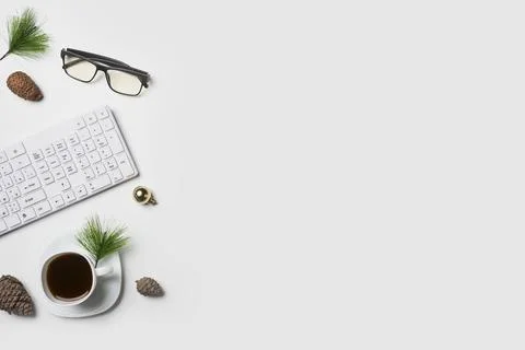 Flat lay Office desk table with computer keyboard and Christmas decoration toys Stock Photos