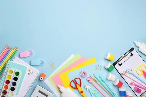 Flat lay office supplies. Various stationery on a light blue background Stock Photos