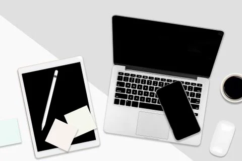 Flat lay office table with laptop computer, digital tablet, mobile phone and  Stock Photos