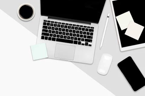 Flat lay office table with laptop computer, digital tablet, mobile phone and  Stock Photos