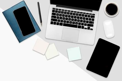 Flat lay office table with laptop computer, digital tablet, mobile phone and  Stock Photos