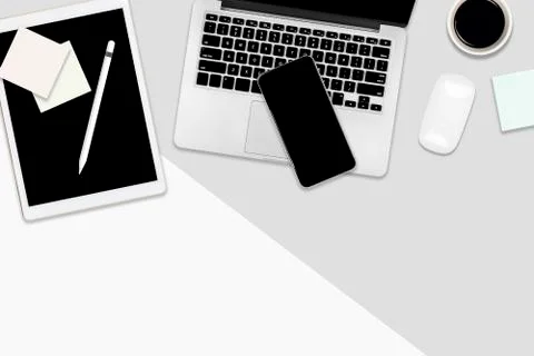 Flat lay office table with laptop computer, digital tablet, mobile phone and  Stock Photos
