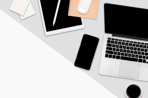 Flat lay office table with laptop computer, digital tablet, mobile phone and  Stock Photos