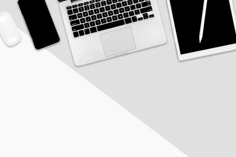 Flat lay office table with laptop computer, digital tablet, mobile phone and  Stock Photos