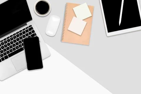 Flat lay office table with laptop computer, digital tablet, mobile phone and  Stock Photos