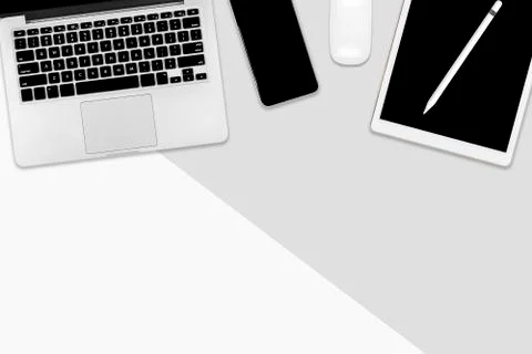 Flat lay office table with laptop computer, digital tablet, mobile phone and  Stock Photos