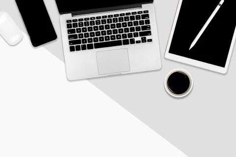 Flat lay office table with laptop computer, digital tablet, mobile phone and  Stock Photos