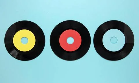 Flat lay old disc records blue background flat lay old disc records blue b... Stock Photos