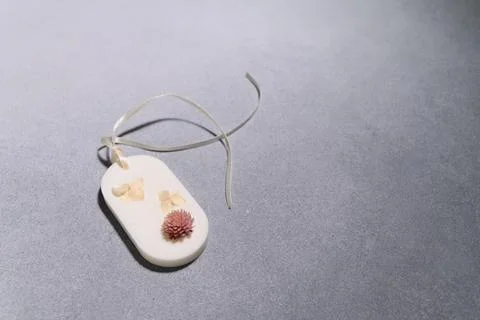 Flat lay of one Florentine Aromatic Sachet with Dried Flowers in Shape of an  Stock Photos