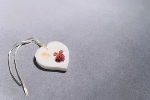 Flat lay of one Florentine Aromatic Sachet with Dried Flowers in Shape of Hea Stock Photos