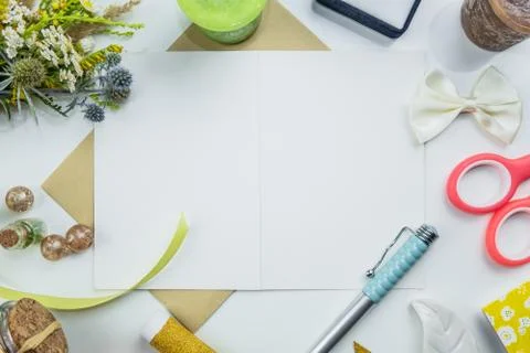 Flat lay of open postcard with empty space for slogan or invitation for a weddin Stock Photos