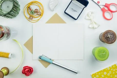 Flat lay of open postcard with empty space for slogan or invitation for a weddin Stock Photos