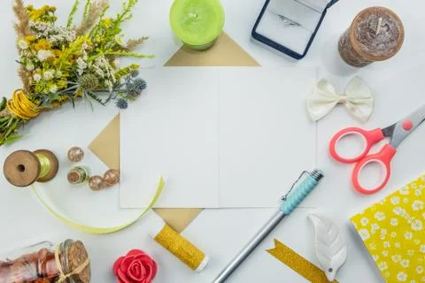 Flat lay of open postcard with empty space for slogan or invitation for a weddin Stock Photos