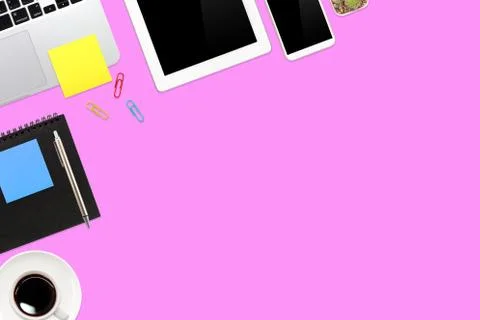 Flat lay or top view workspace office pink desk with laptop computer Stock Photos