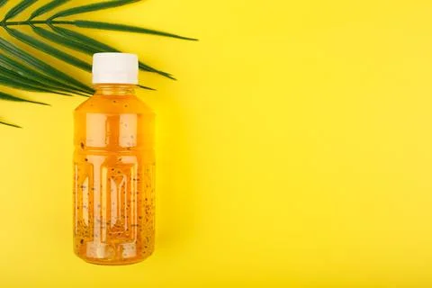 Flat lay with orange smoothie or detox fresh juice with chia seeds on yellow Stock Photos