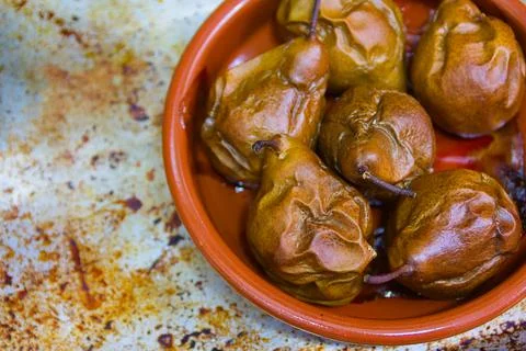Flat lay of an oven casserole with roasted pears Stock Photos