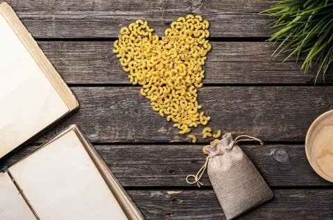 Flat lay of pasta in a shape of a heart 写真素材