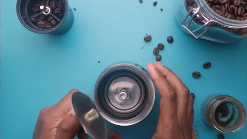 Flat lay person making espresso coffee with moka pot - 8s Stock Footage 130158836