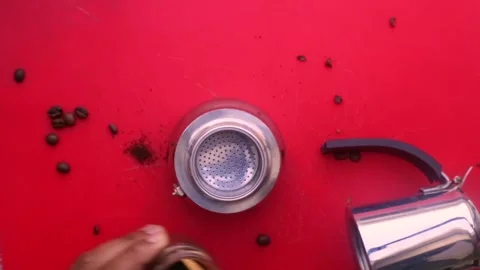 Flat lay person preparing espresso coffee with a moka pot - 8 sec Stock Footage 130617881