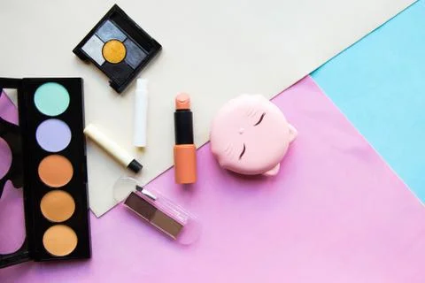 Flat lay photo with set of different makeup cosmetics Stock Photos