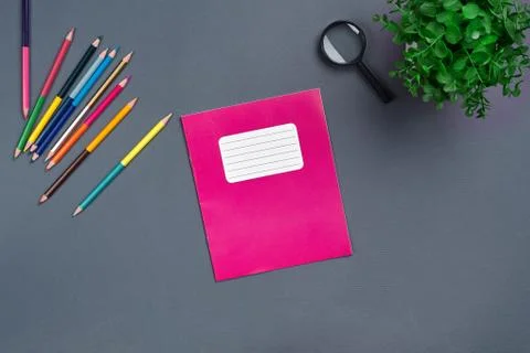 Flat lay photo of workspace desk with school accessories or office supplies. Stock Photos