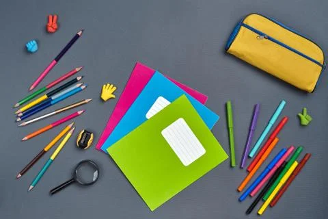 Flat lay photo of workspace desk with school accessories or office supplies. Stockfoto's