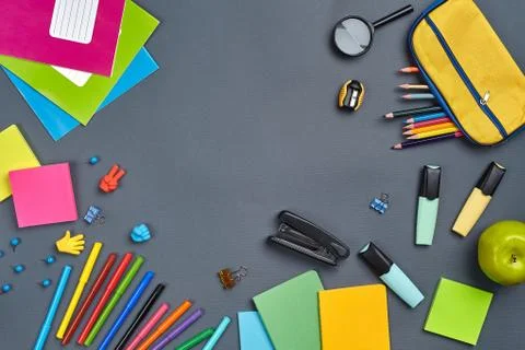 Flat lay photo of workspace desk with school accessories or office supplies. Stock Photos