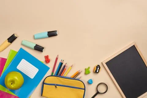 Flat lay photo of workspace desk with school accessories or office supplies. 写真素材