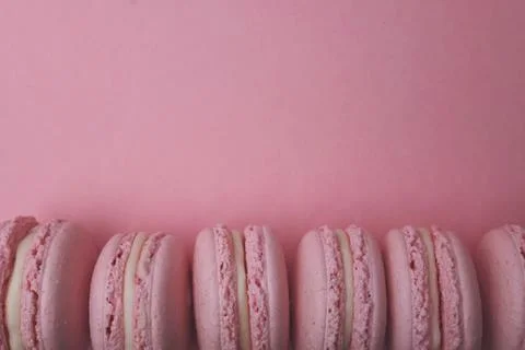 Flat lay pink macaroons Stock Photos