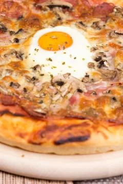 Flat lay pizza with egg ham mushrooms Stock Photos