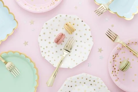 Flat lay plastic plates forks Stock Photos