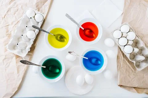 Flat lay Preparing for Easter with liquid food coloring. Different colors in Stock Photos