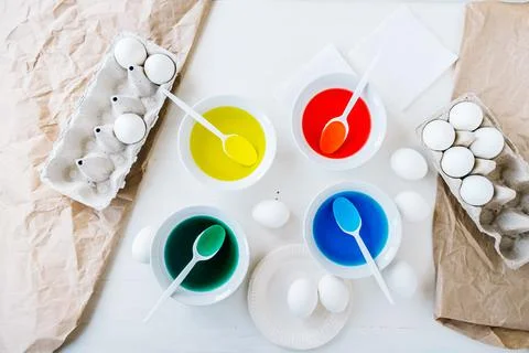 Flat lay Preparing for Easter with liquid food coloring. Different colors in Stock Photos