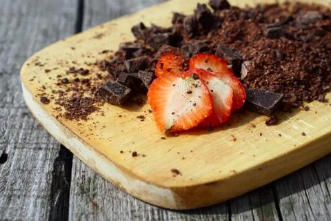 Flat lay  of Raw cocoa beans,  cocoa powder, chocolate on sacking  on wooden  Stock Photos