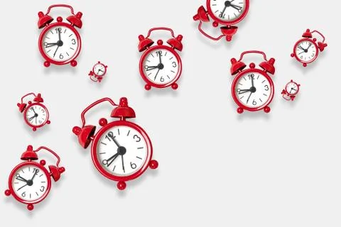 Flat lay red alarm clock pattern on a white background with copy space. You c Stock Photos