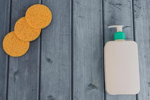 Flat lay with reusable sponge for make-up remover, cosmetic hygiene product Stock Photos