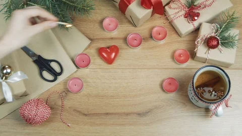 Flat lay scene video of gift boxes on wooden table , pine branches with beaut Stock-Footage 110704609
