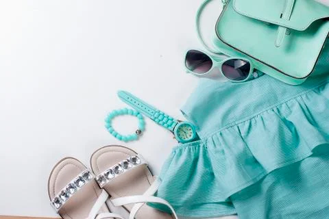 Flat lay set of  child clothe  In turquoise colors Stock-Fotos