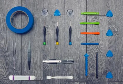 Flat lay of set of hand tools for DIY repairs on wooden surface Foto stock