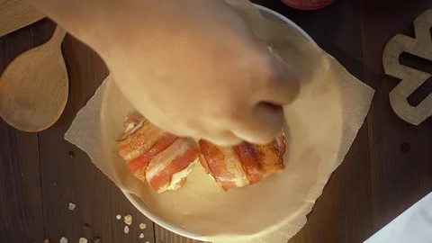 Flat lay shot: chef adds chopped dill to the roasted rolls with chicken, cooked Stock Footage 114487037