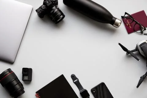 Flat Lay Shot Of Techno Items For Traveller With Smartwatch Mobile Phone And  Stock Photos