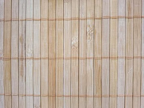 Flat lay showing thin vertical bamboo slats bound by horizontal threads in .. Stock Photos